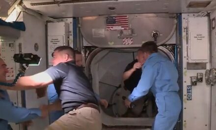 Astronaut Doug Hurley bangs his head as he enters International Space Station